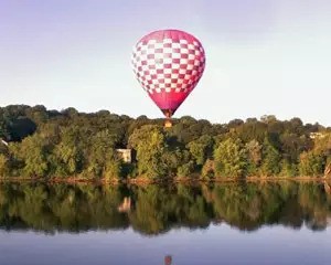 Hot air balloon over a river