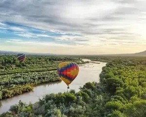 Hot air Balloons over a lake